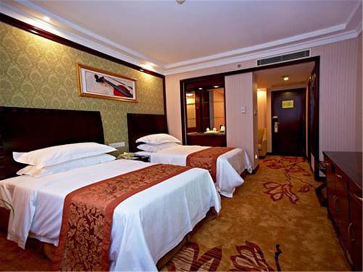 Vienna International Hotel Shanghai Train Station Bagian luar foto