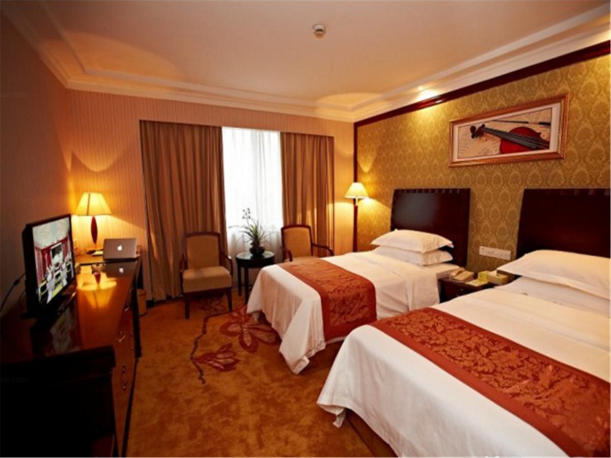 Vienna International Hotel Shanghai Train Station Bagian luar foto
