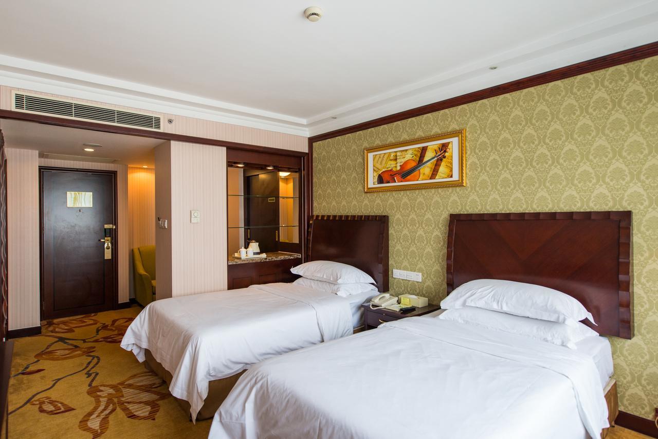 Vienna International Hotel Shanghai Train Station Bagian luar foto